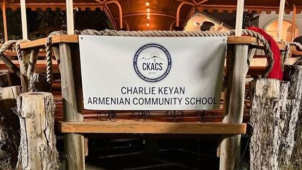 Charlie Keyan Armenian Community School banner with the CKACS logo