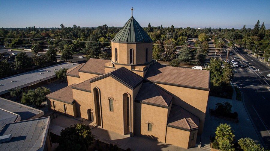 St. Paul Armenian Church, a tan stone church in classic Armenian style with a green conical dome, seen from above
